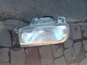 VW Jetta 3 headlight Original Hella  Left Side and Wheel Caps