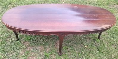 Oval Coffee Table with rose design on the sides