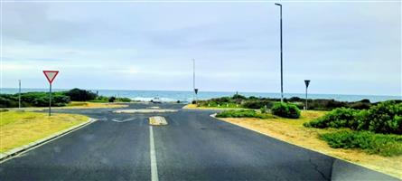 PRIME CORNER PLOT WALKING DISTANCE FROM THE OCEAN!