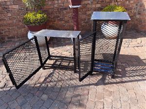 Cages for gas bottles.