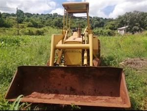 John Deer TLB in good working condition, semi-auto. 