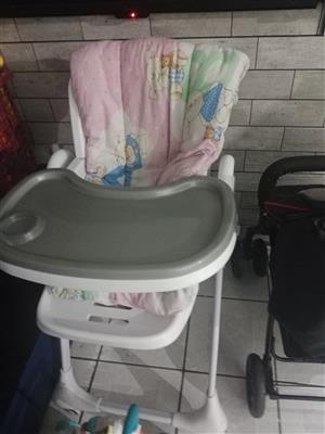 Feeding chair and walking ring 