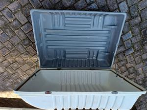 Tough-shell, fully lockable storage unit with wheels for easy mobility.