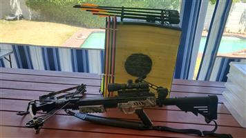 Hunting bows and rifles for sale. Many extras .Excellent condition 