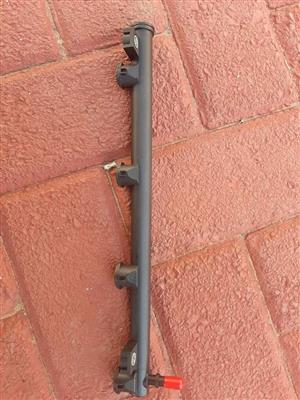 NP200 16V INJECTOR RAIL. BRAND NEW. FOR VARIOUS OTHER CARS TOO.