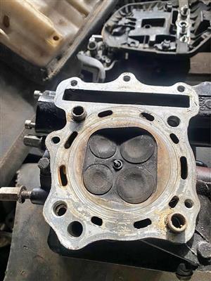 Hyosung GT 650 cylinder head. Meyerton bike scrapyard new and secondhand spares and accessories.