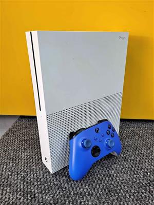 Microsoft Xbox One S console with a blue wireless controller