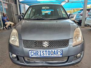 2009 model Suzuki Swift GL hatchback automatic transmission petrol 1.4 engine capacity mileage