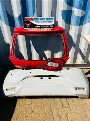 Toyota Starlet/Suzuki Baleno rear/back parts (bumper,tailgate and RT taillight
