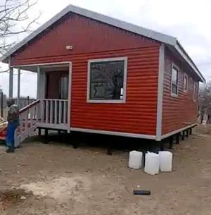 Nutec house and log cabin