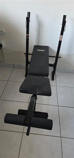 1 x home Power gym 1.0 Trojan, hardly used and1 x barbell bench with bar