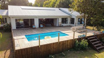 Versatile Family Home with Two Flatlets, Solar Power & Exceptional Outdoor Living in Mountain Homes,