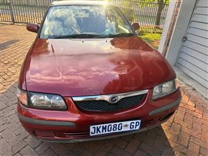Mazda for sale - Red - Good Condition - Reliable Daily Drive