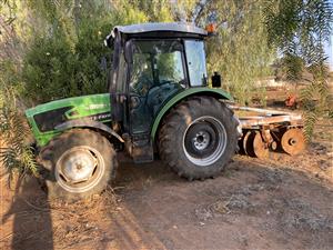 Farm tractor and implements farmer retires