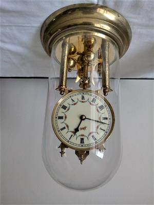 Antique clock with glass. Sad to see it go. This belonged to my late Dad .