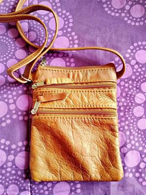 GENUINE LEATHER SLINGBAG
