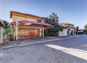 Spacious 4-Bed Home in Secure Complex with Entertainment Area, Double Garage & Prime Location