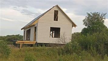Nutec and log cabin house