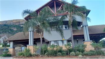 Spectacular vacant land with panoramic dam and mountain views