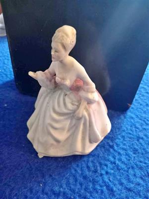 Royal Doulton lady Sadly has damage