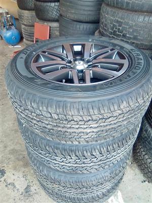18" Toyota Hilux/Fortuner original mags with brand new 265/60/18  new Dunlop  A/T set for R14799.