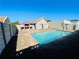 Elegant 4-Bedroom Home with Swimming Pool in Gonubie Seaside Suburb