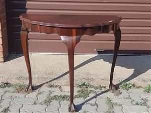 Queen Anne revival demi-lune imbuia table.