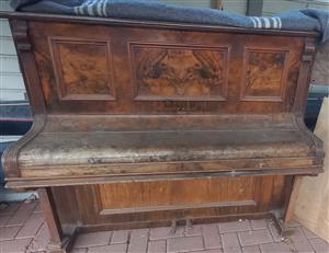 Antique Piano with wooden and ivory keys