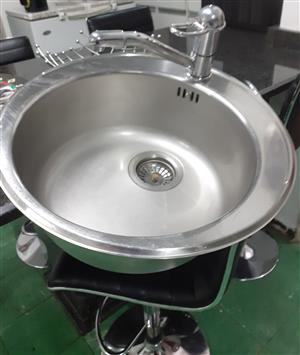 Wash basin with mixer