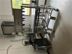 Water bottling plant - As good as new (very little used) - Bottles 5000L per day