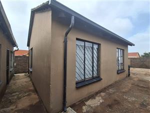 2 bedroom house in Evaton North with 3 communal cottages.