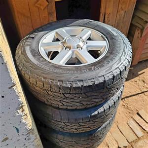 Isuzu 16 inch rims with tyres 6k   Tyre size 245/70R16  Rims in good condition so are tyres