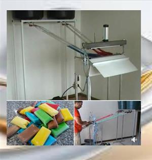 semi automatic ice lolly machine, 4 lane, includes tanks and stand