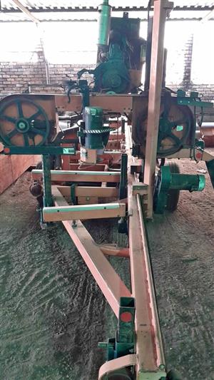 Woodmizer LT 40 on trailer.  Hidrolic fully with wood lifter on side.