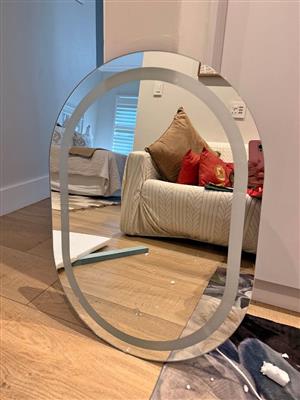 One Bathroom Mirror with back lit.