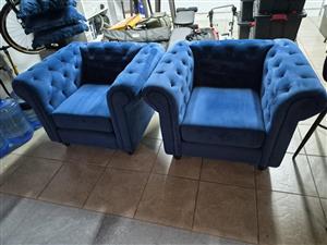 Two blue Gomma Gomma lounge chairs