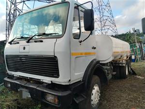 Water tankers and Mercedes trucks