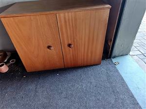Small wooden cupboard with one shelf