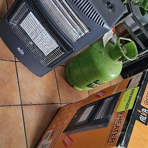 Gas + electric heater with 9kg Gas cylinder with gas in it