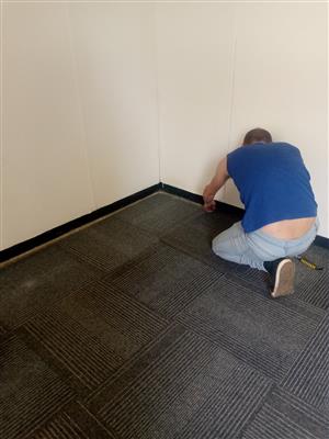 Uplifted Carpet Tiles upply and fit 