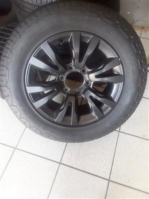 18inch Isuzu X-Rider mag with used 255/60/18 tyre to use for spare.
