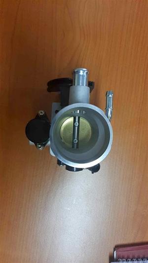 CORSA GAMMA THROTTLE BODY. BRAND NEW. FOR VARIOUS OTHER CARS TOO.