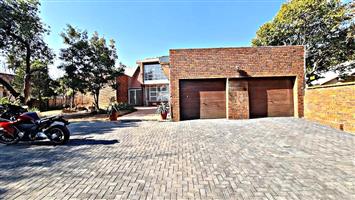 Double-Storey Family Home in Prestigious Waterkloof – Selling for a Steal