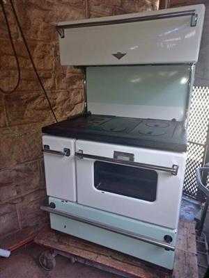 Wood Burning Defy Ruby Stove  Stove cleaned & repaired fired up to see if in good working order prio