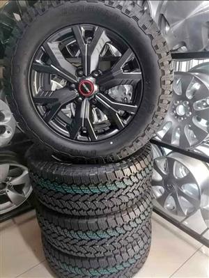 18inch Isuzu -Rider OEM mags with brand new 255/60/18 General Grabber AT3 set 
