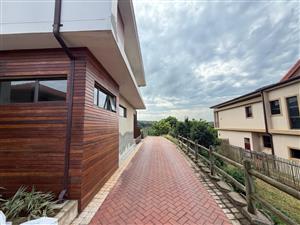 Stylish 5-Bedroom Home with Pool & Sea Views in Hilltop Estate