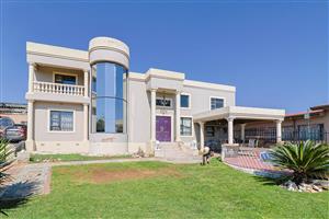 Expansive Designer Home: 2 Houses, 2 Bachelors, 2 Domestic Quarters—Endless Potential Awaits!