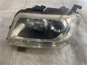 2013 SUZUKI GRAND VITARA XENON HEADLIGHT LEFT SIDE FOR SALE.