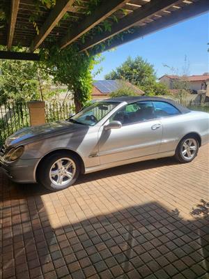 Mercedes Benz 320 CLK convertible. 230 000km.  2003.  Silver/black.  