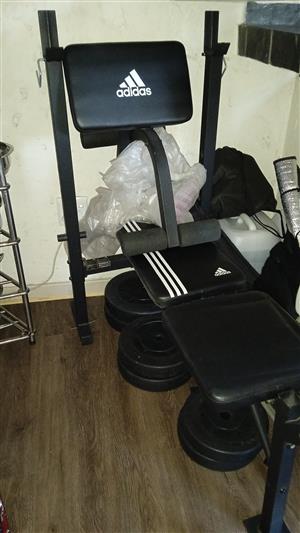 Selling an adidas gym set including leg extension & precher curl extension with